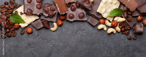 Various chocolate pieces, coffee beans and nuts