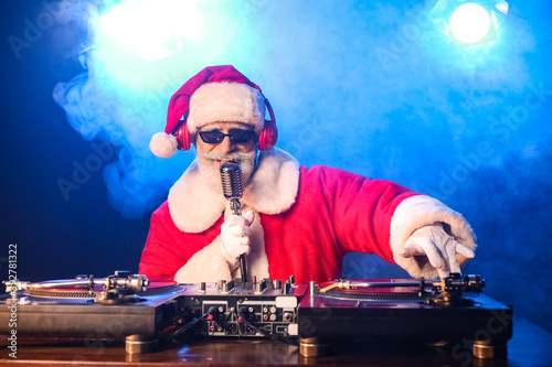 Cool Santa DJ playing music...