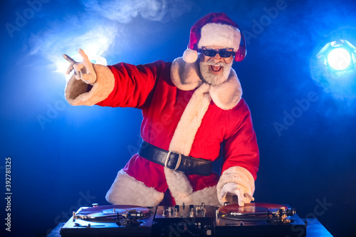 Cool Santa DJ playing music...