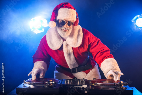 Cool Santa DJ playing music...