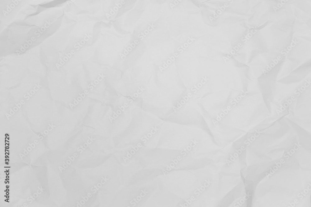 Obraz premium White crumpled paper texture background.