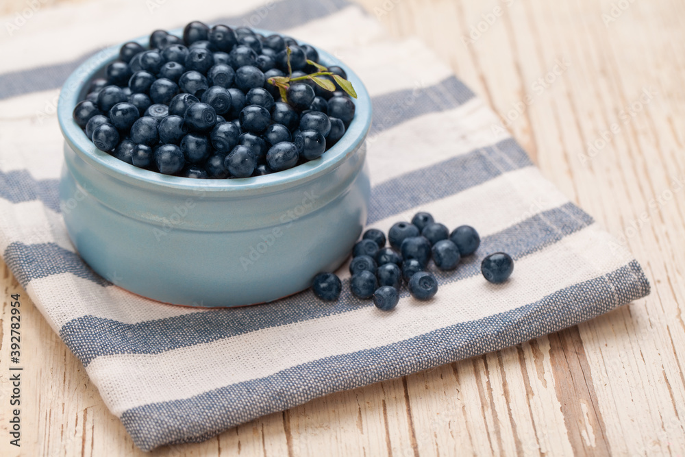 Fresh blueberries on wooden board background. Healthy eating Fresh blueberries on wooden board background. Healthy eating