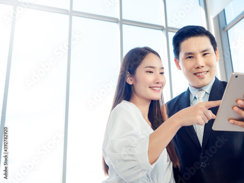 Business couple working together. Free Download Business couple working together. - GFXLoad