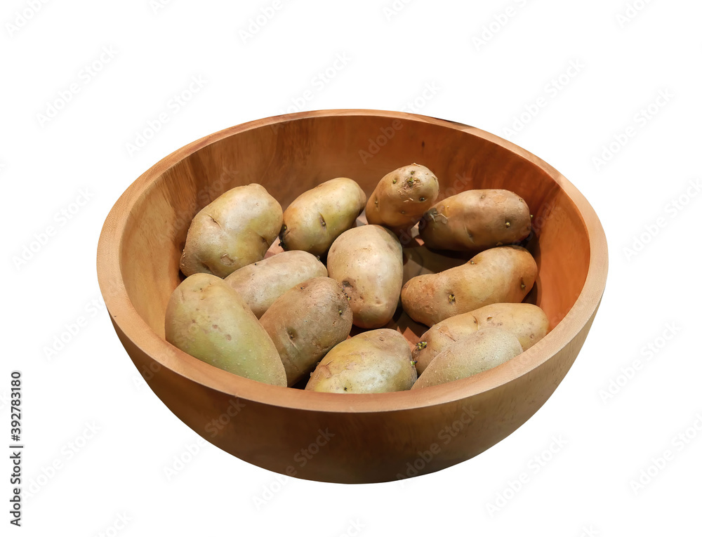 Fresh potatoes in wooden bowl isolated on white background. Fresh potatoes in wooden bowl isolated on white background.