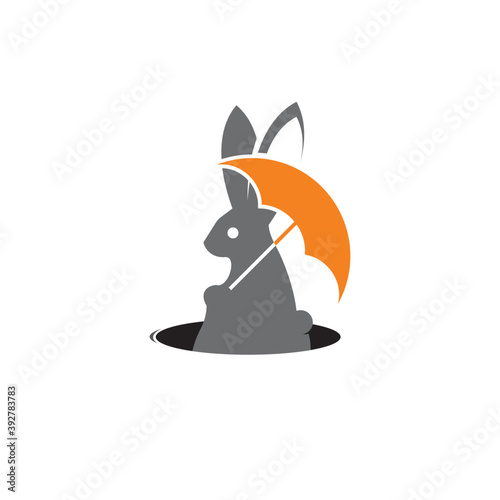 simple rabbit silhouette holding an umbrella vector icon