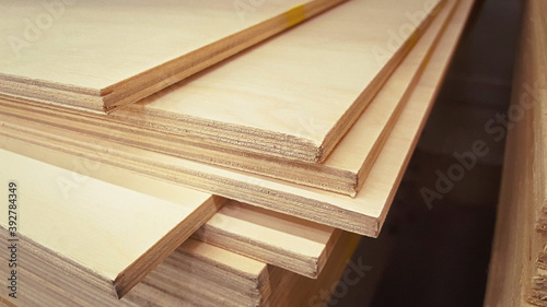 Close-up stack of plywood edges in the store