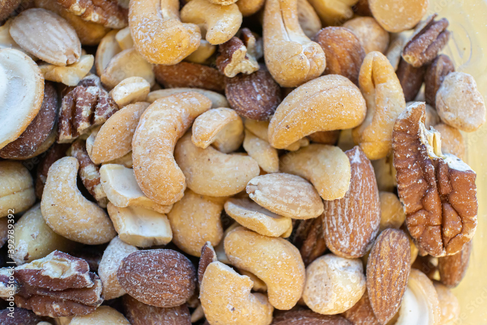 Fototapeta premium Collection of Nuts - in a bowl ready to eat