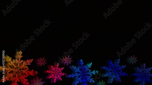 beautiful new year's video with colorful snowflake on a black background
