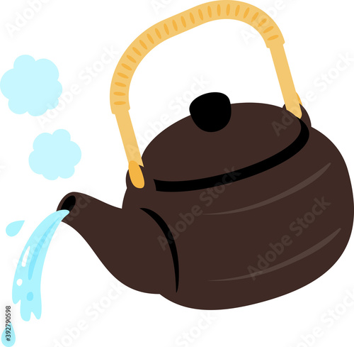 傾けた土瓶から注がれる湯