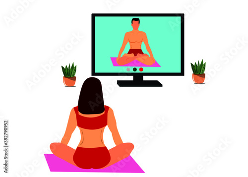 woman learning yoga from online instructor