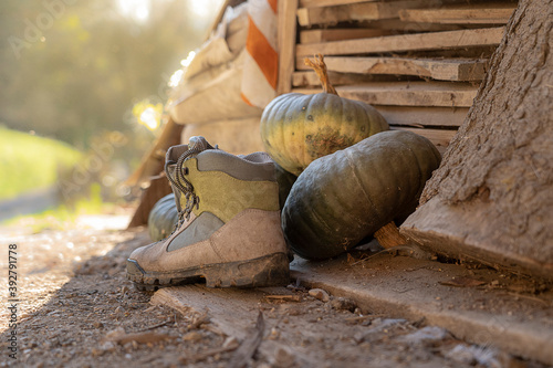 old boots in the entrance of the house. Put to dry after a day of trekking.