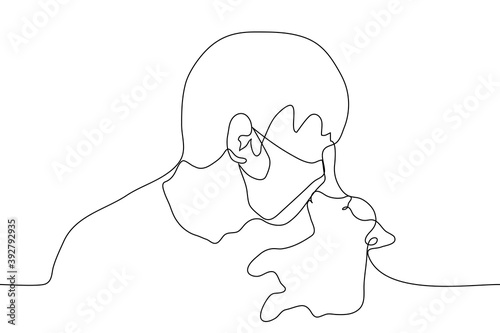 man in a mask kisses a puppy. one line drawing of a dog lover squeezing a small dog.