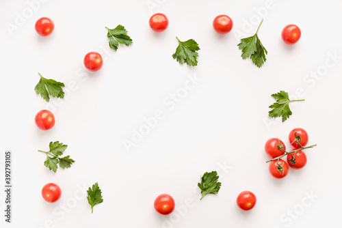 cherry tomatoes on a white background, frame of vegetables