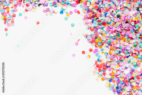 colored confetti on white background, color background