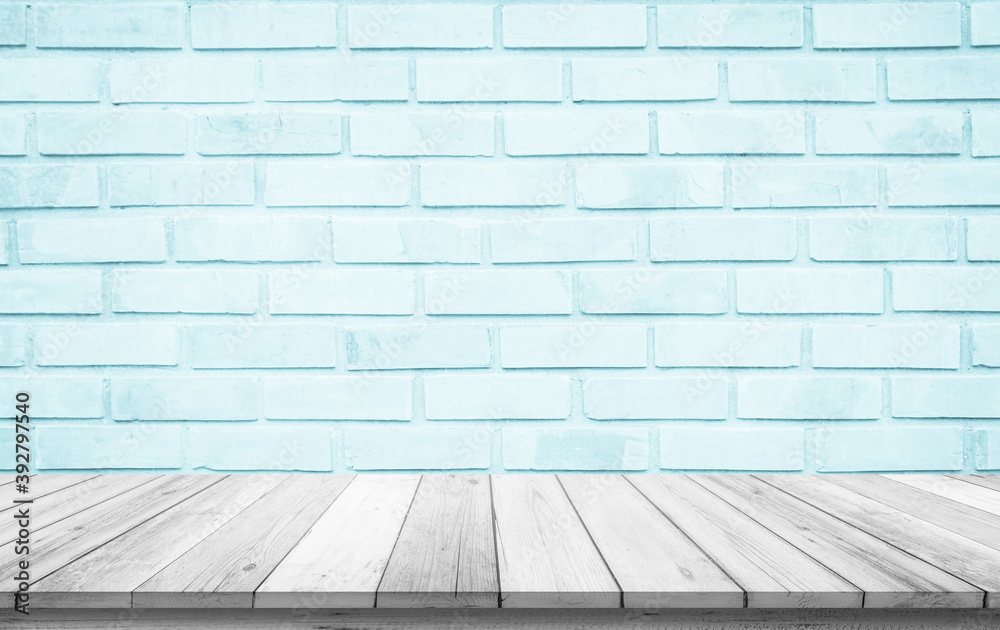 Empty wooden table top on blue brick wall background, Design wood counter white. Perspective for show space for your copy and branding. Can be used as product display montage. Vintage style concept.