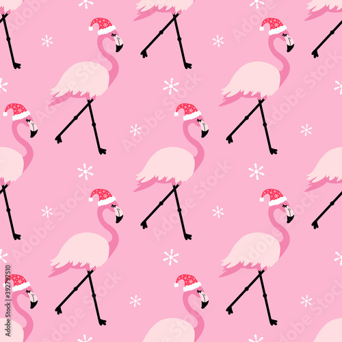 Cute cartoon style pink tropical flamingo in santa hat vector seamless pattern background for Christmas design.
