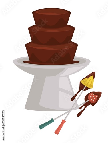 Chocolate fountain and fruits on fork fondue pineapple and strawberry