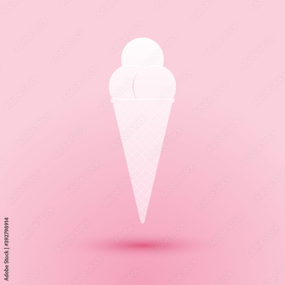 Paper cut Ice cream in waffle cone icon isolated on pink background. Paper art style. Vector.
