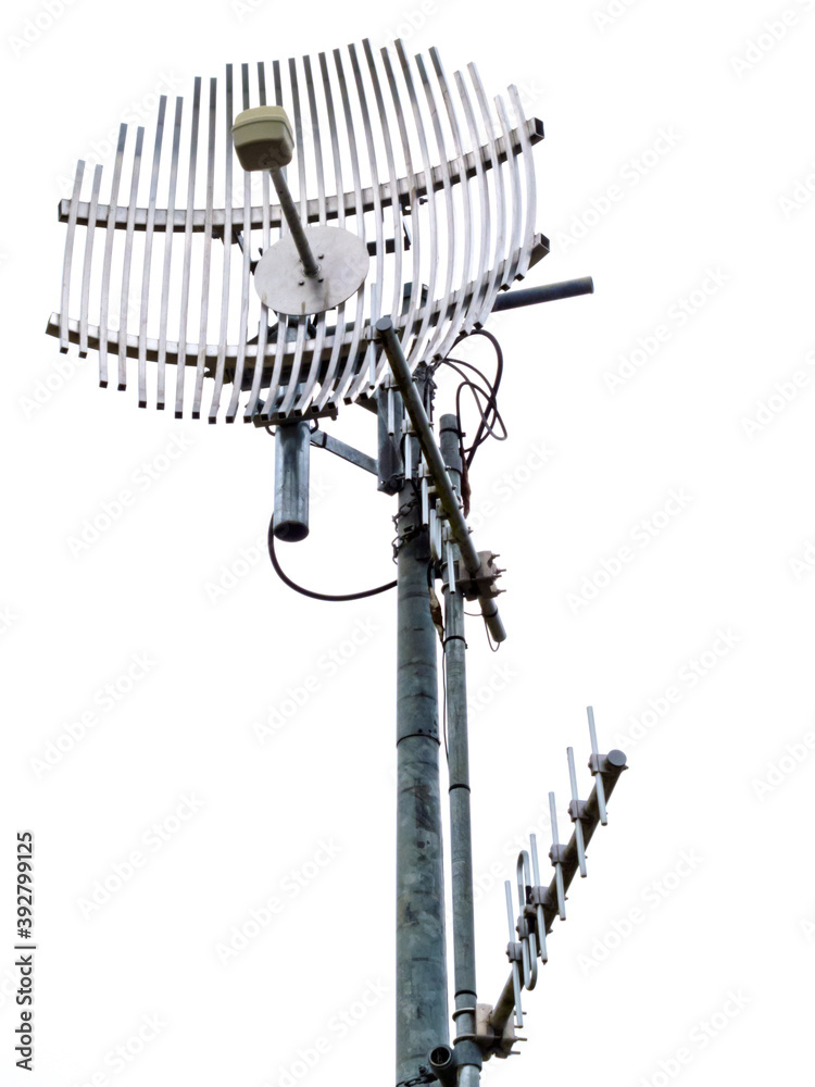 Metal telecom tower and antennas isolated on white Metal telecom tower and antennas isolated on white