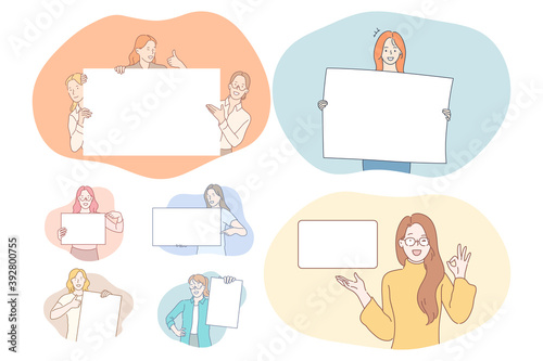 Demonstration, promotion, advertisement concept. Young positive cartoon characters holding and pointing with fingers at white blank placard with copy space for text and advertising isolated over white