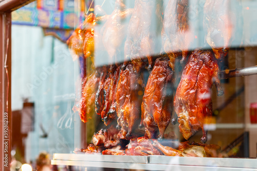 Roast ducks on display at a Chinese restaurant in London Chinatown photo