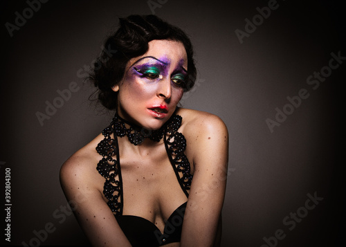 Woman with a 20's cabaret make-up and hair look