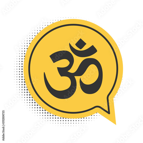 Black Om or Aum Indian sacred sound icon isolated on white background. The symbol of the divine triad of Brahma, Vishnu and Shiva. Yellow speech bubble symbol. Vector.