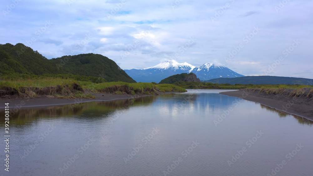 Beautiful volcanoes of Kamchatka. Hills, mountains and plains of Kamchatka.