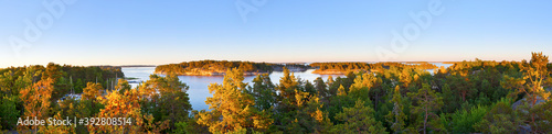 Panoramic photo of Swedish nature archipelago during late summer, evening sunset.