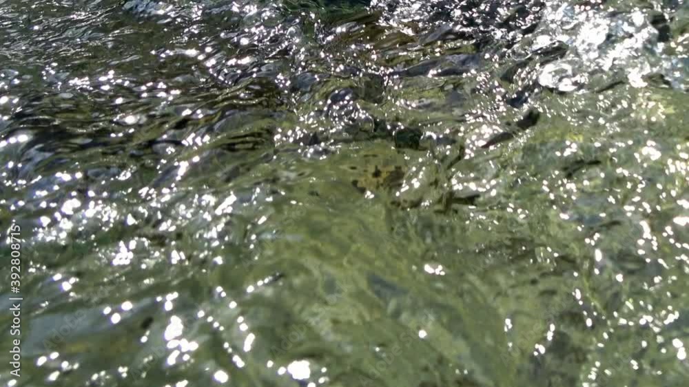 The fast flowing waters of the mountain river sharpen the stone and create incredible patterns. Underwater view. The fast flowing waters of the mountain river sharpen the stone and create incredible patterns. Underwater view.