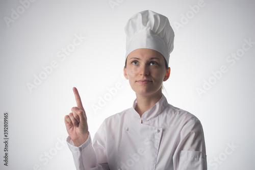 Chef woman. Isolated on gray background
