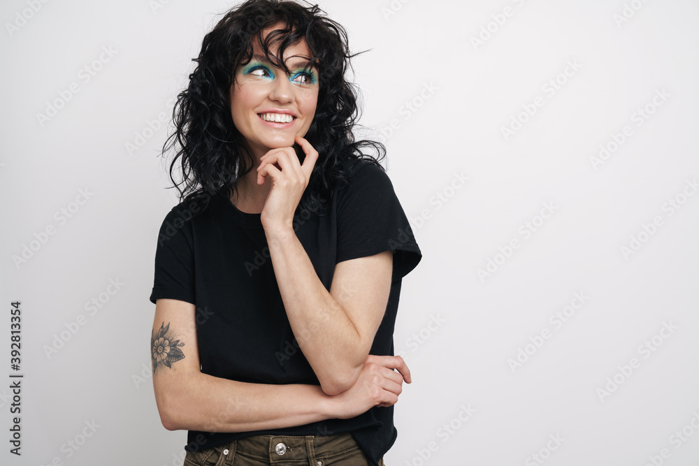 Pretty thoughtful woman standing isolated Pretty thoughtful woman standing isolated