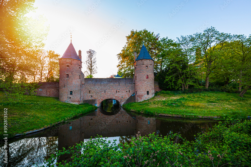 Old water gate Monnikendam in Amersfoort city. Two towers are connected to an arch gate.