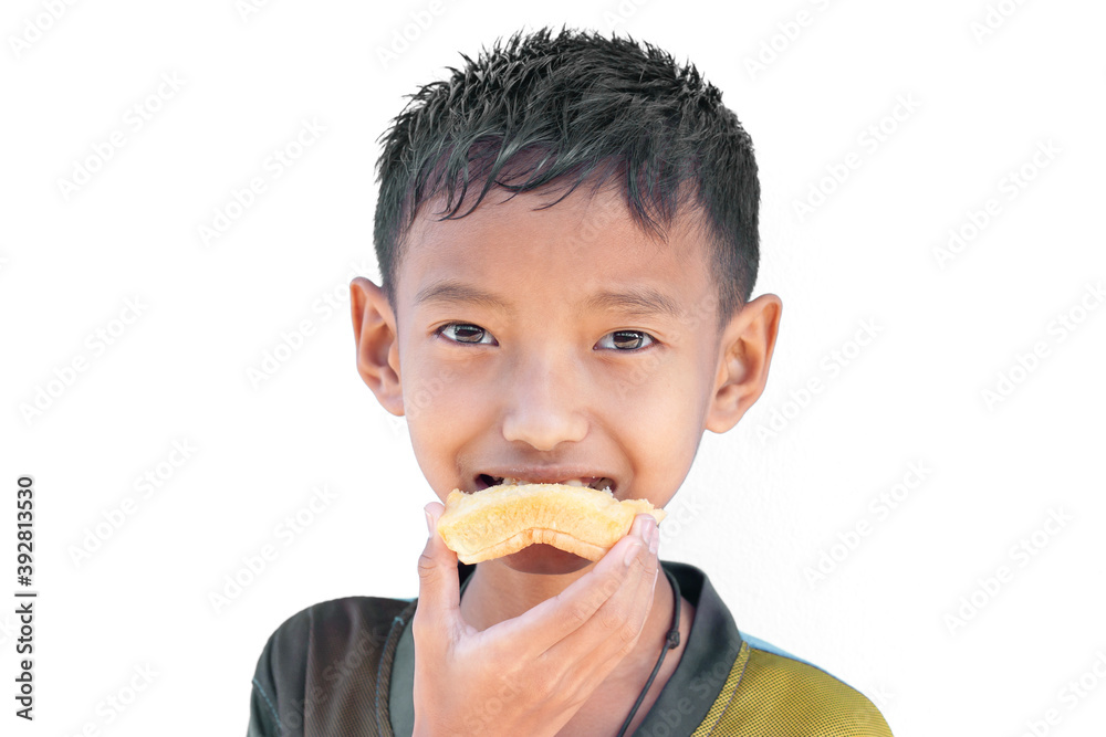 Happy Asian boy enjoying eating a slice of bread, having a hearty breakfast isolated on white background. Happy Asian boy enjoying eating a slice of bread, having a hearty breakfast isolated on white background.