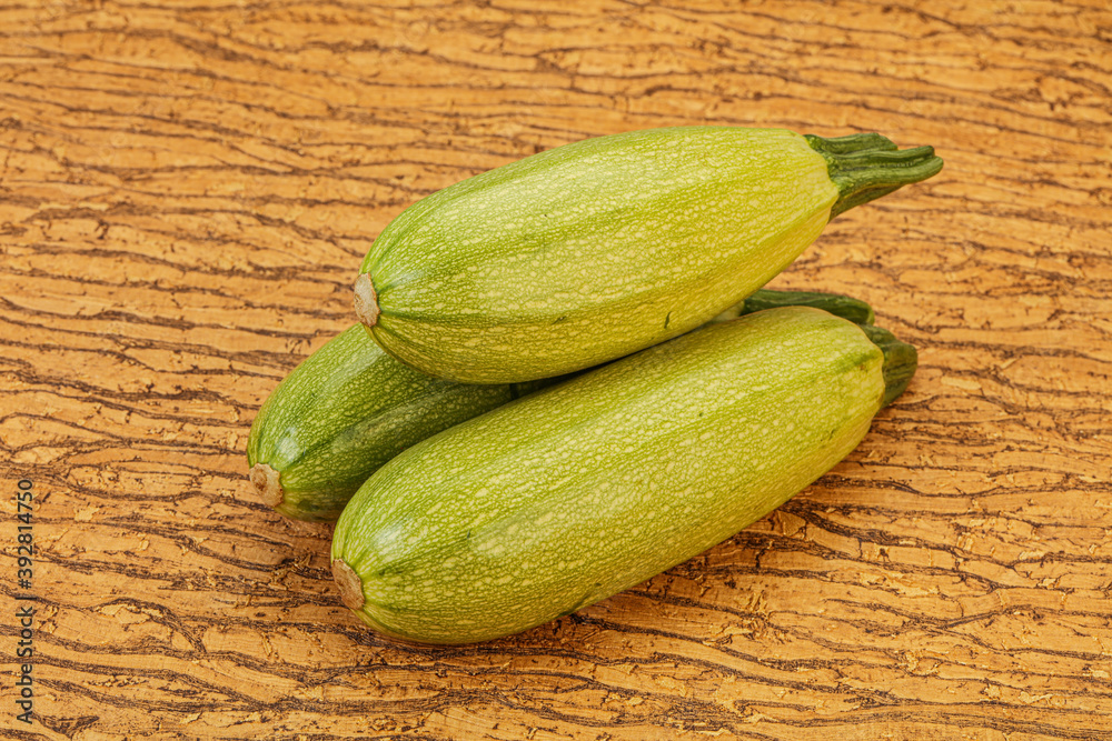 Young tasty zucchini over board Young tasty zucchini over board