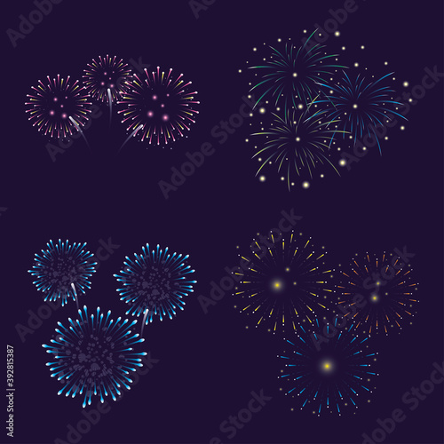 four blue and pink fireworks splash lights in sky night