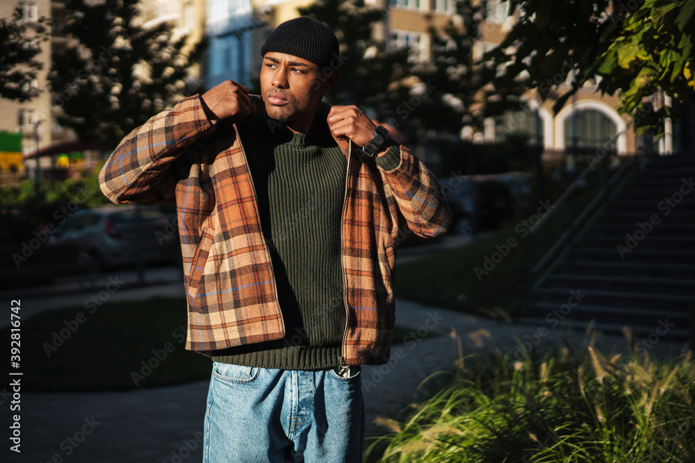 Fototapeta premium Confident stylish young afro american man walking