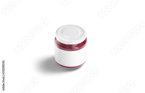 Blank small glass jar with white label and jam mockup photo