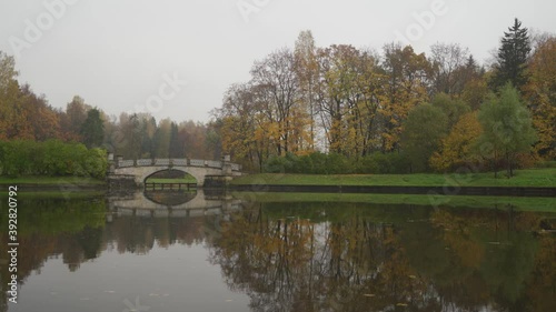 Pavlovsk park in autumn, St. Petersburg, Visconti bridge spanning the Slavianka river photo