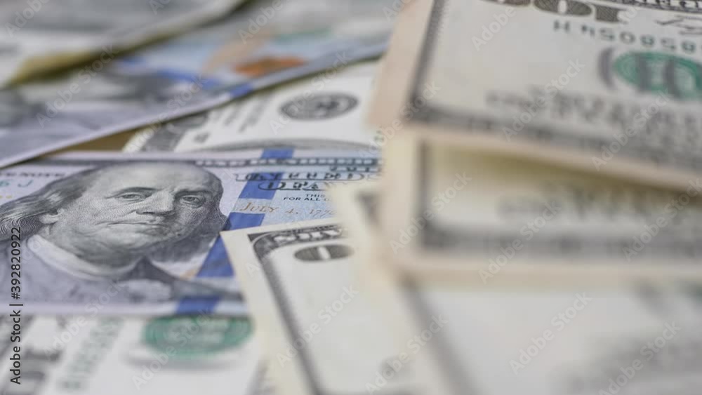 Lots of Spread out American Bills on Table. Banknotes of One Hundred US Dollars Lots of Spread out American Bills on Table. Banknotes of One Hundred US Dollars