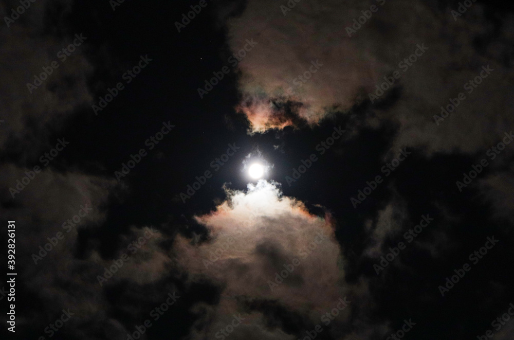 moon in the sky with clouds