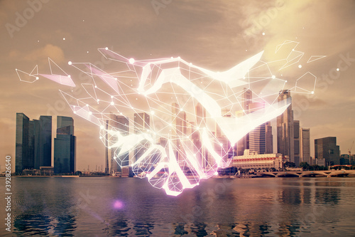 Photography Double exposure of handshake hologram over city view background