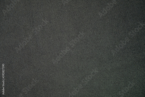 Fleece, polar or Blanket black color fabric texture background.