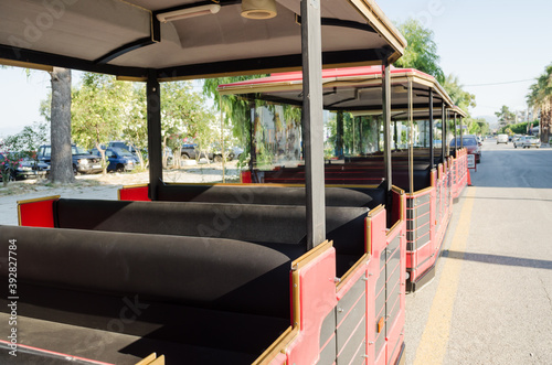 Evia island, Greece - June 30. 2020: Tourist train on the streets of the island of Evia, Greece 