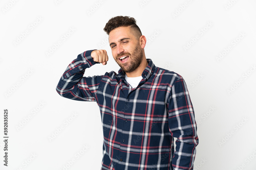 Caucasian man isolated on white background doing strong gesture Caucasian man isolated on white background doing strong gesture