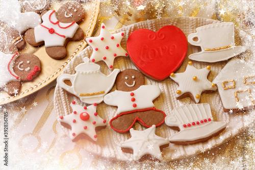 Christmas gingerbreads cookies on wooden table and empty space for text