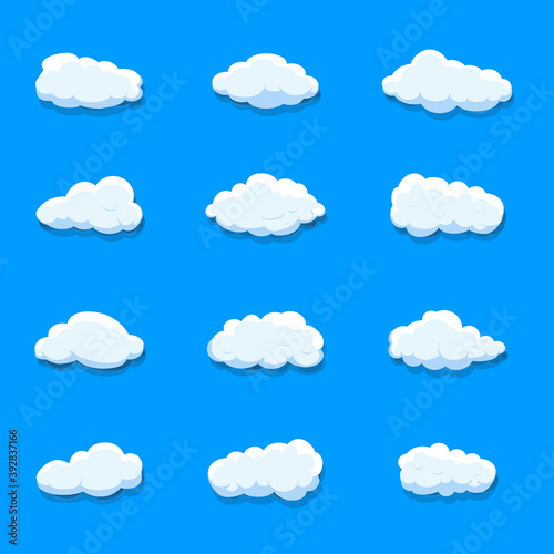 White cartoon clouds set isolated on blue background. Collection of different cartoon clouds for background template, wallpaper and sky design. Cartoon clouds vector. Sky illustration