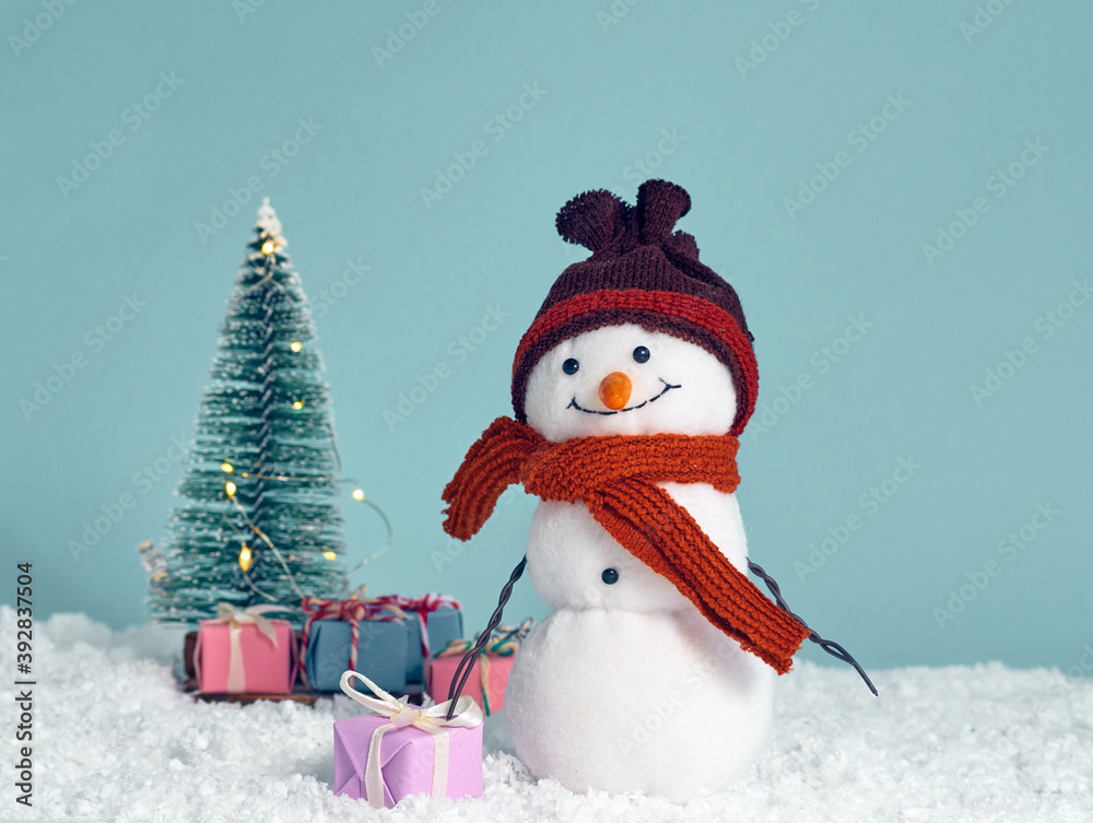 Christmas background with toy snowman.