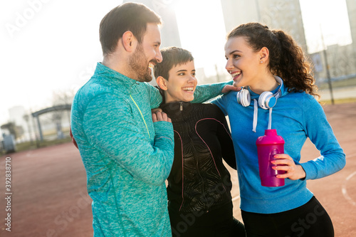 Happy people enjoying friend time at jogging outdoor. Sport people healthy lifesytle concept photo