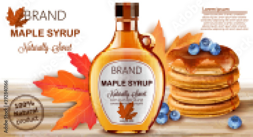 Bottle of natural sweet maple syrup with stacked pancakes with blueberries and autumnal leaves in background. Place for text. Realistic 3D mockup product placement